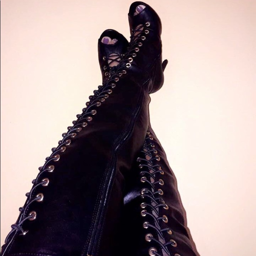 Laced up leather boots